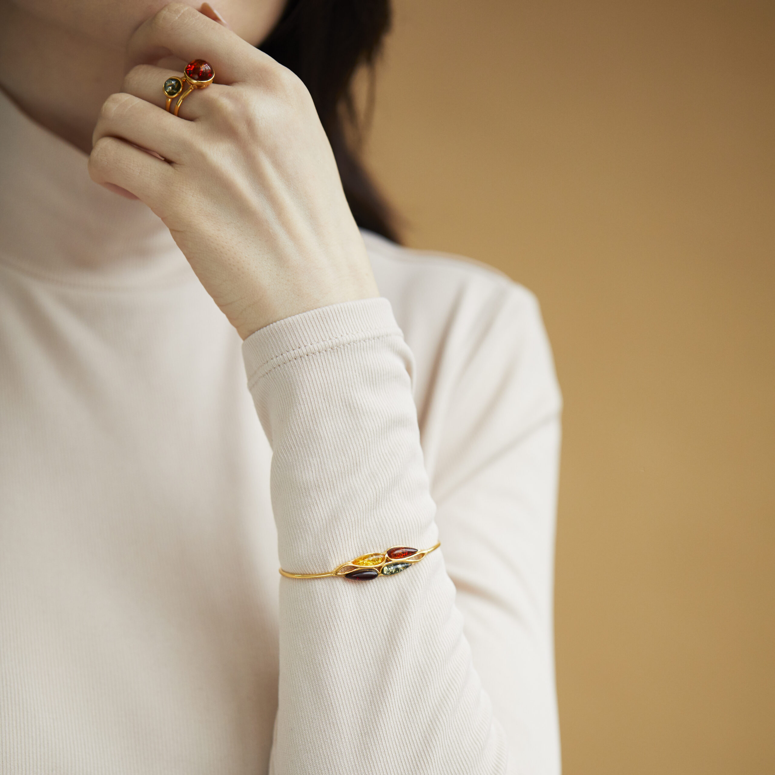 Cuff bracelet with multi-coloured amber